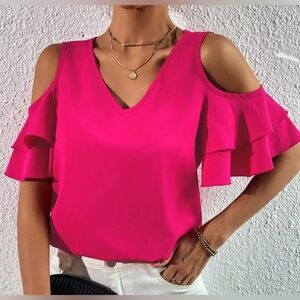 Fuchsia pink blouse.